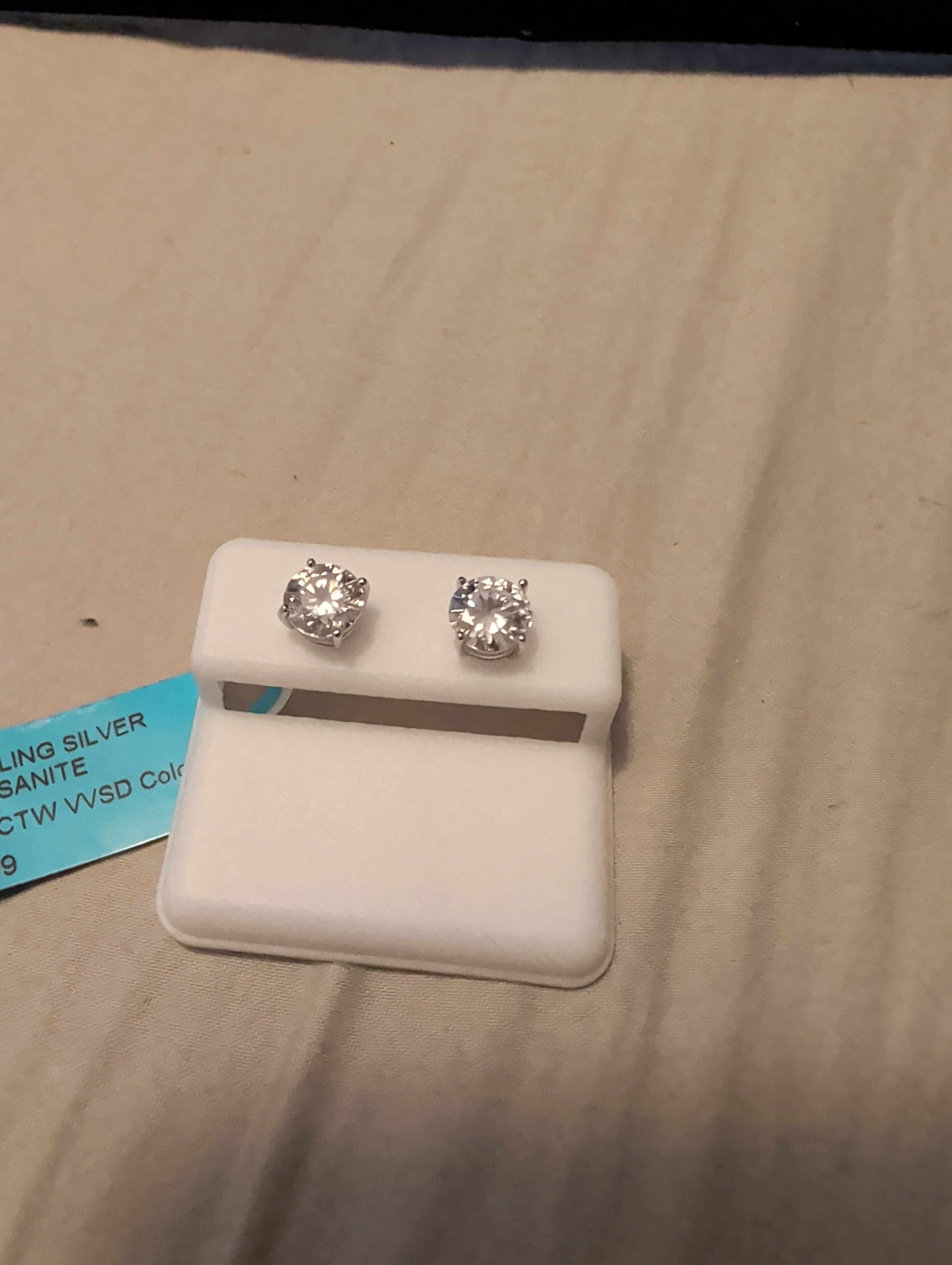 2.40ctw moissanite earrings. Between the two.
