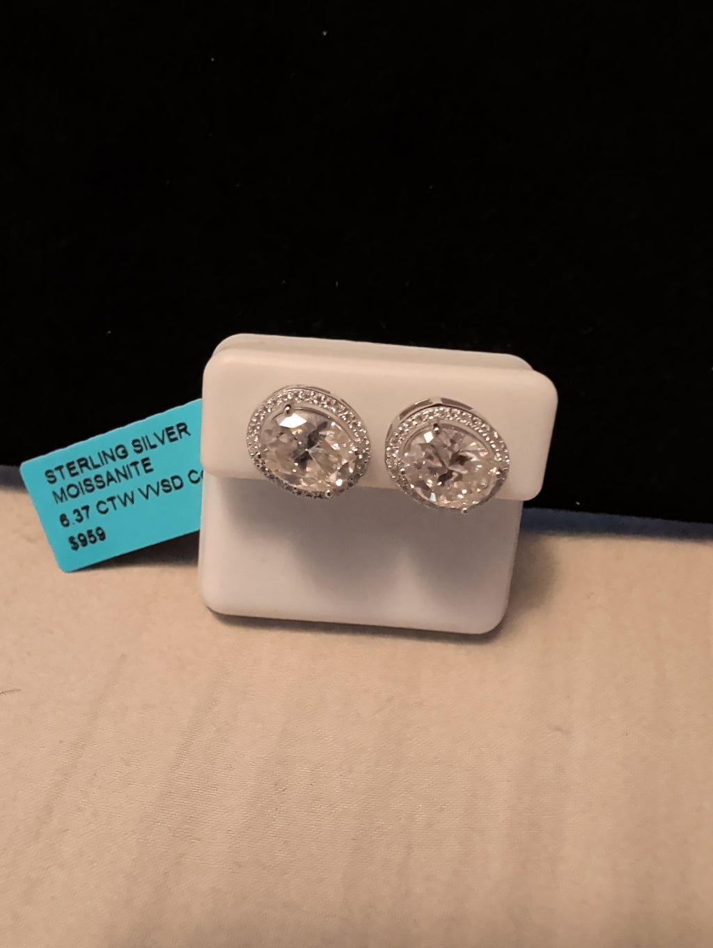 6.37ctw moissanite earrings. Between the two.