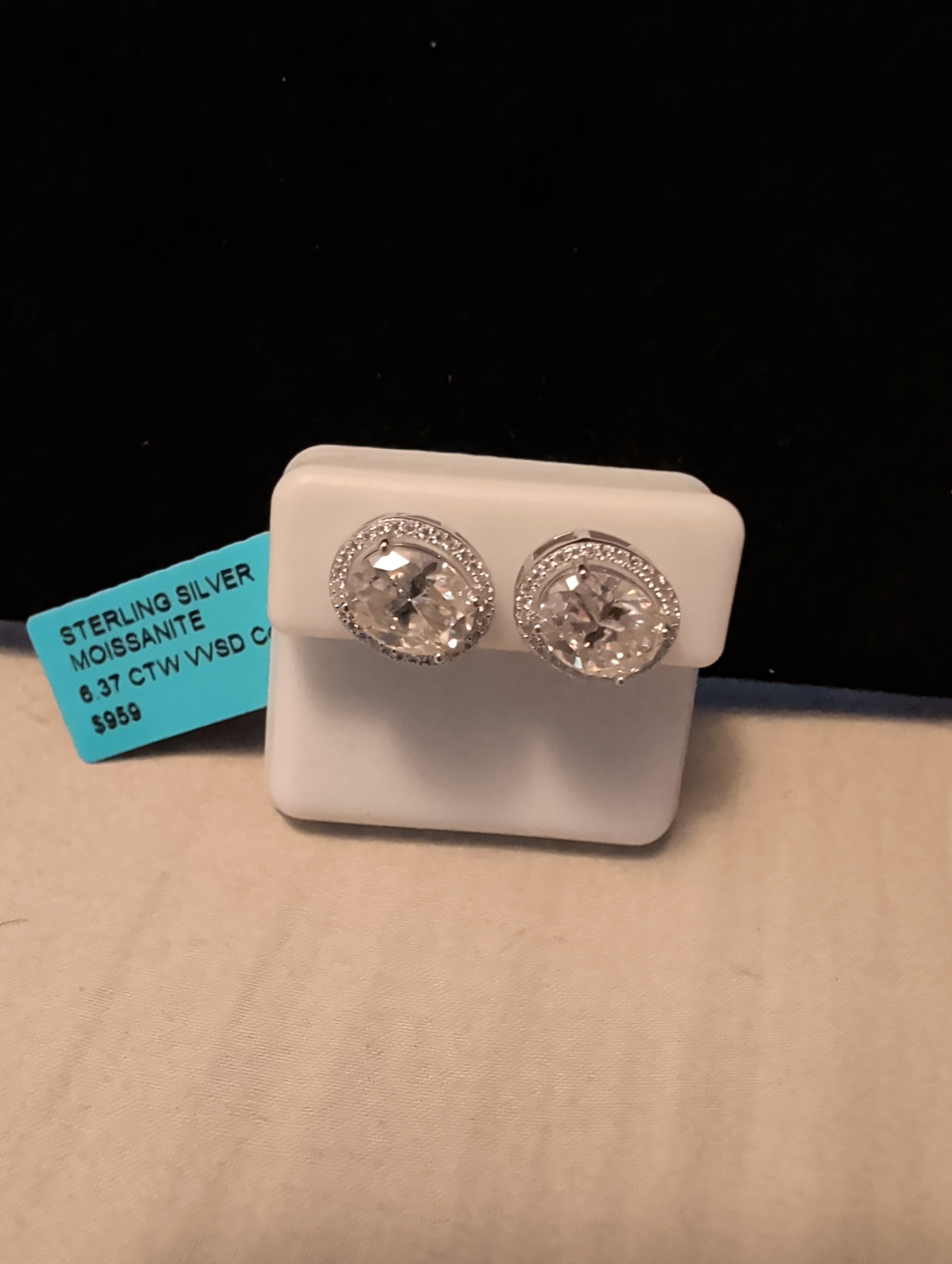 6.37ctw moissanite earrings. Between the two.