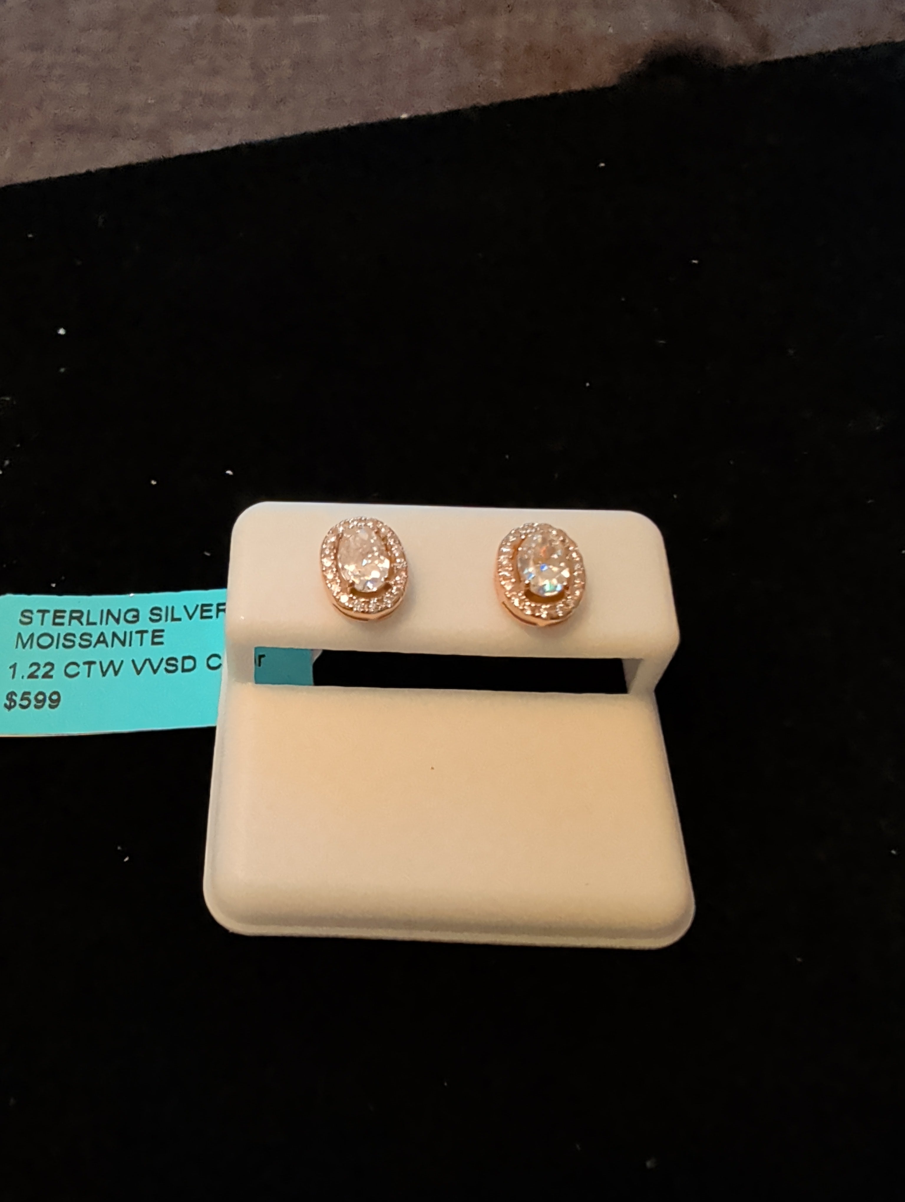 1.22ctw (0.61ctw each) moissanite earrings. 925 sterling silver. Diamond tested!