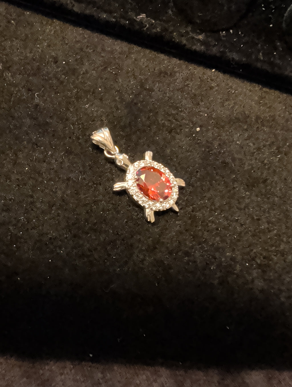 Turtle pendant. Red is cubic zerconia. Outer ring moissanite.
