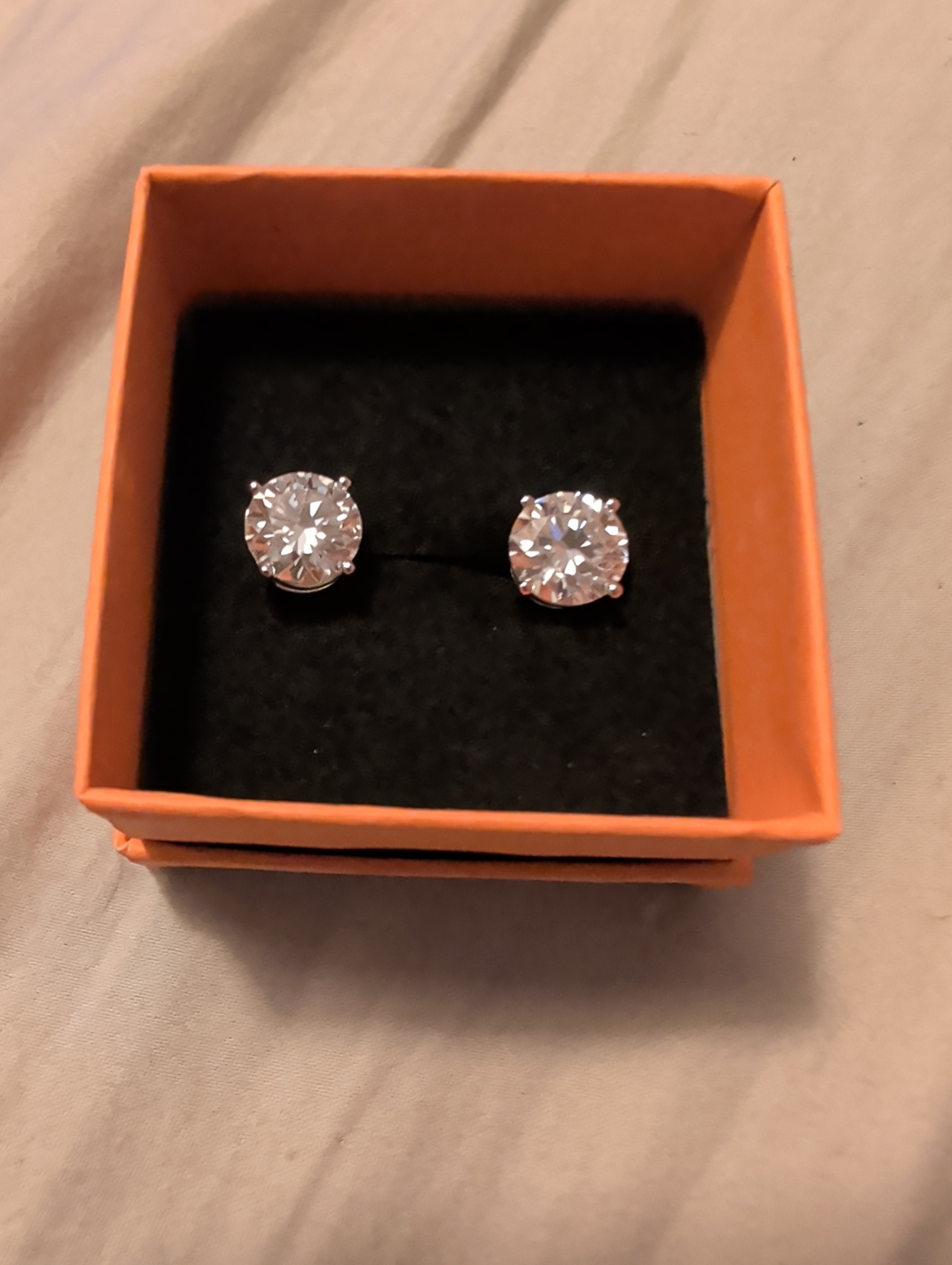 4ctw moissanite round cut earrings. 925 sterling silver. Diamond tested!