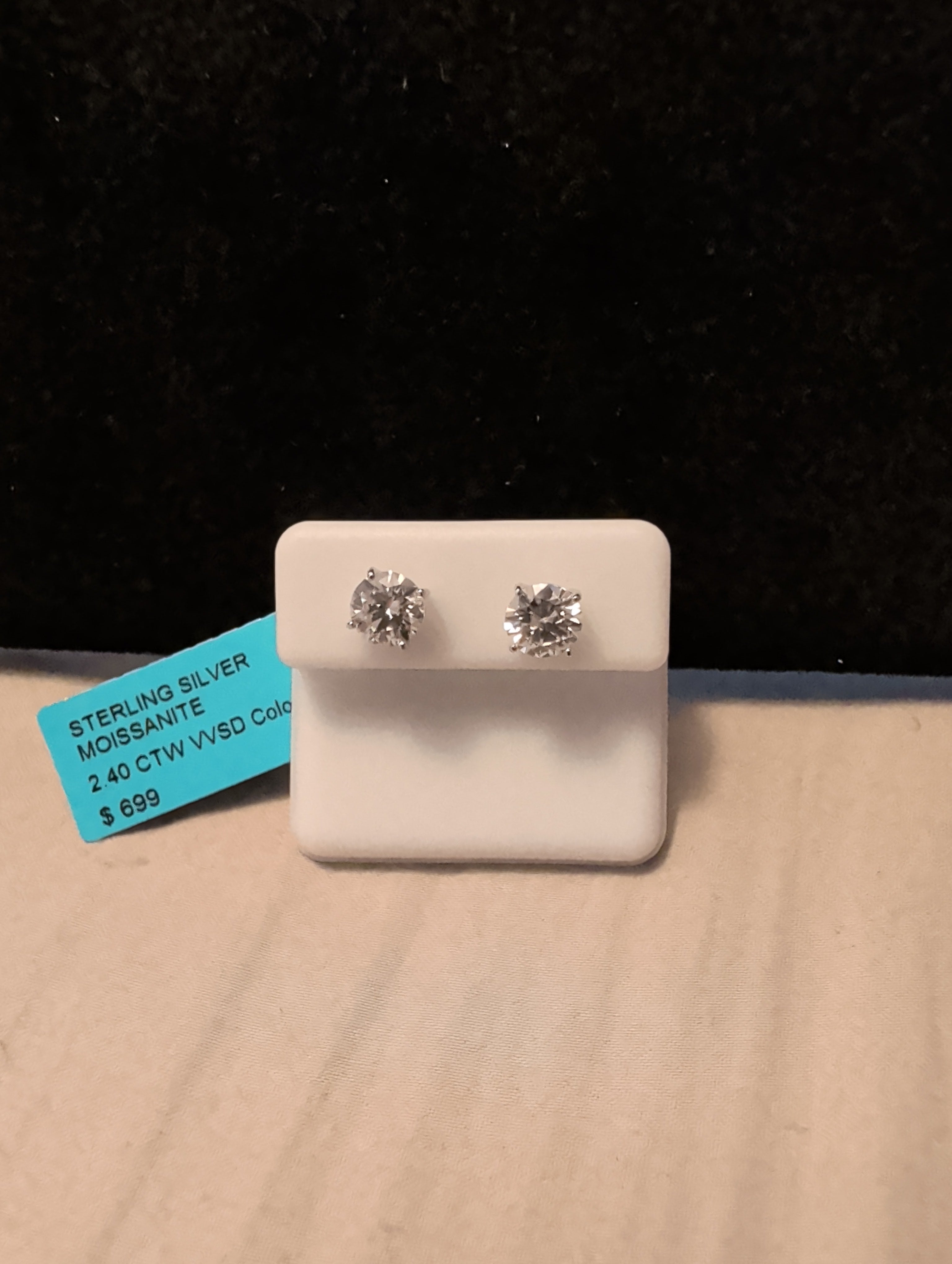 2.40ctw moissanite earrings. Between the two.