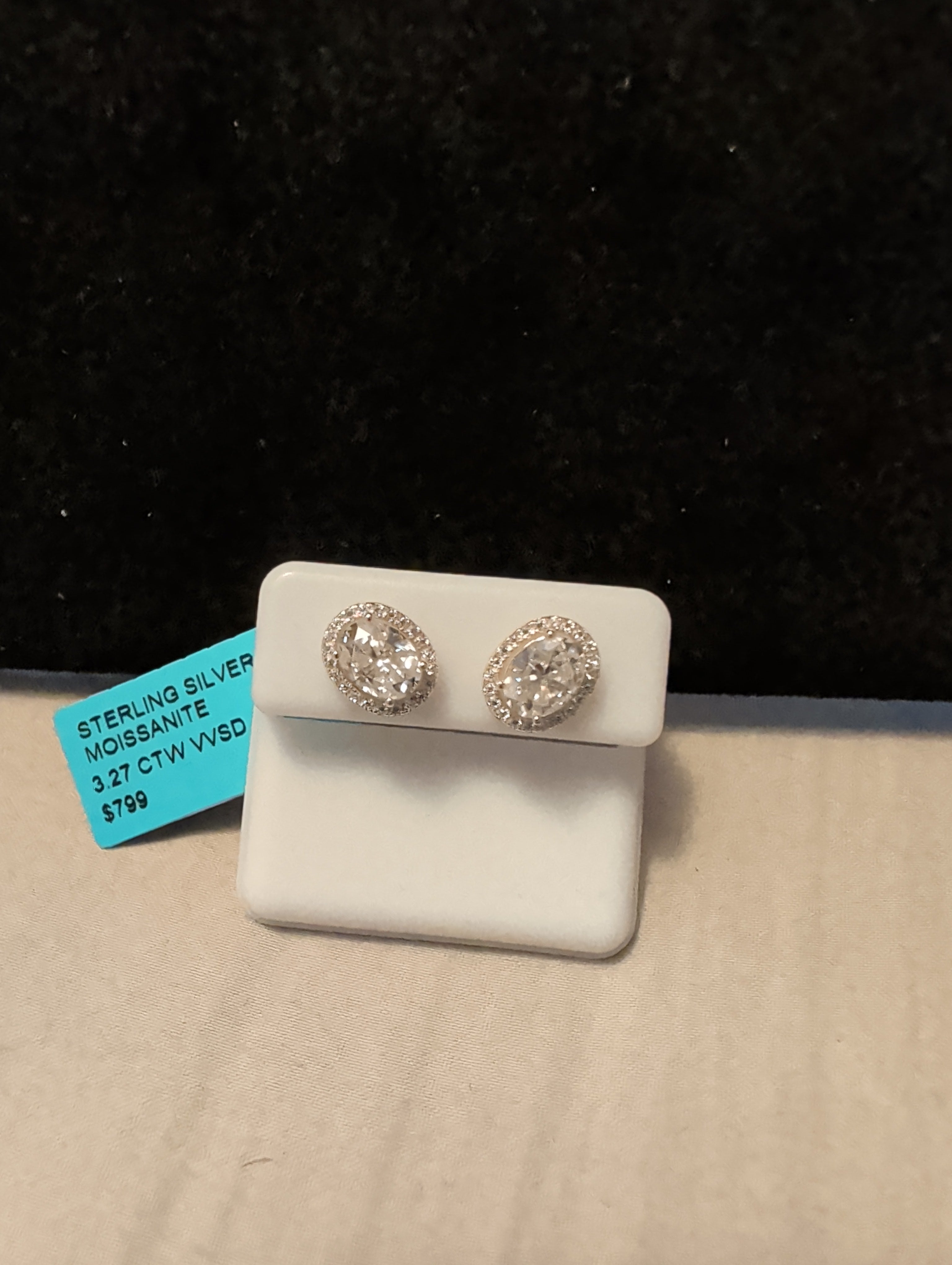 3.27ctw moissanite earrings. Between the two.