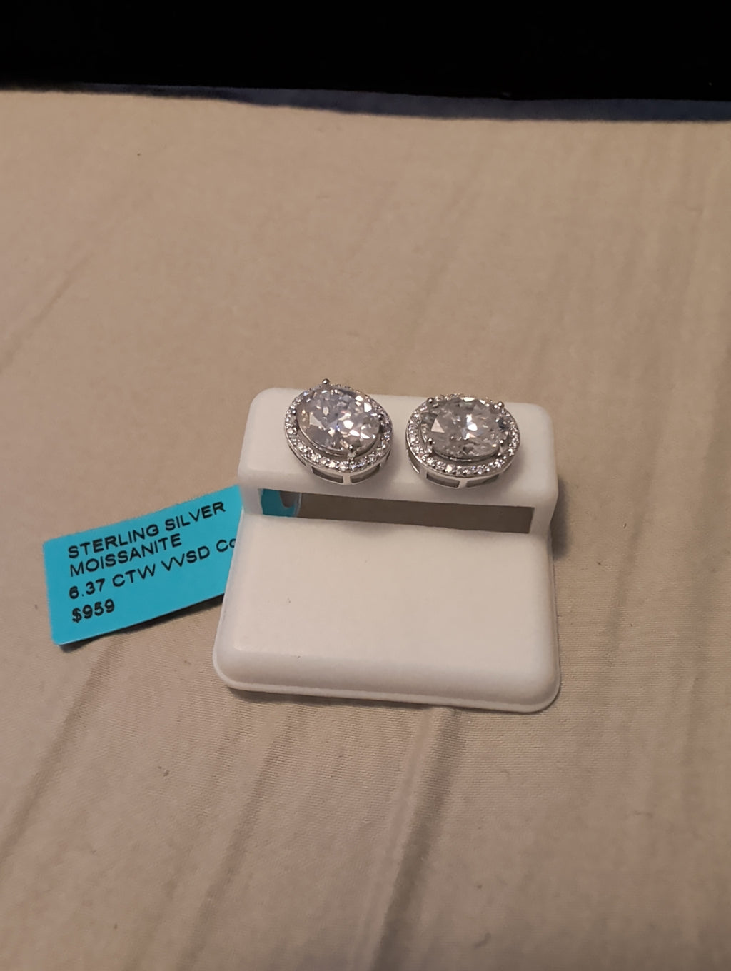 6.37ctw moissanite earrings. Between the two.