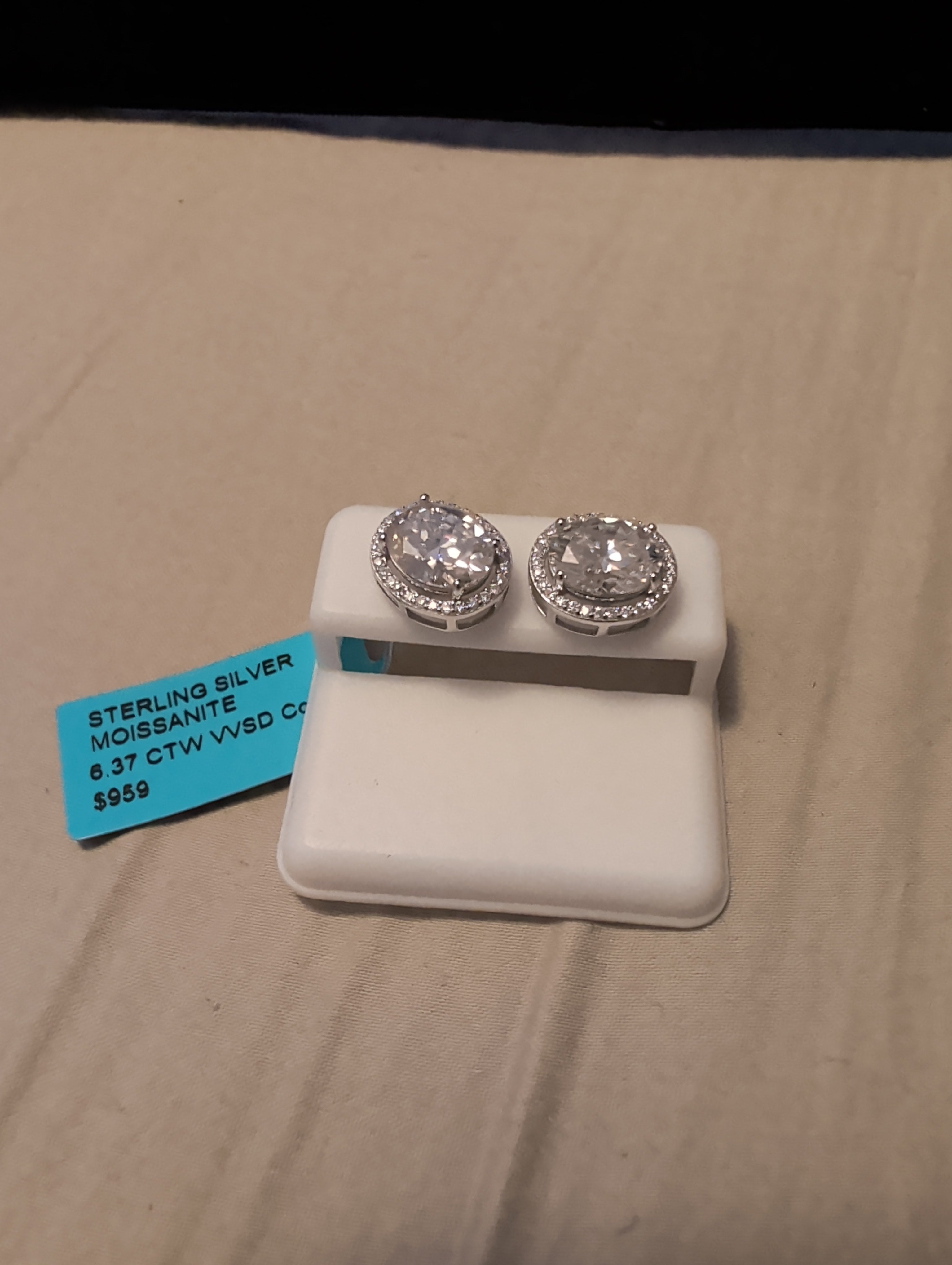 6.37ctw moissanite earrings. Between the two.