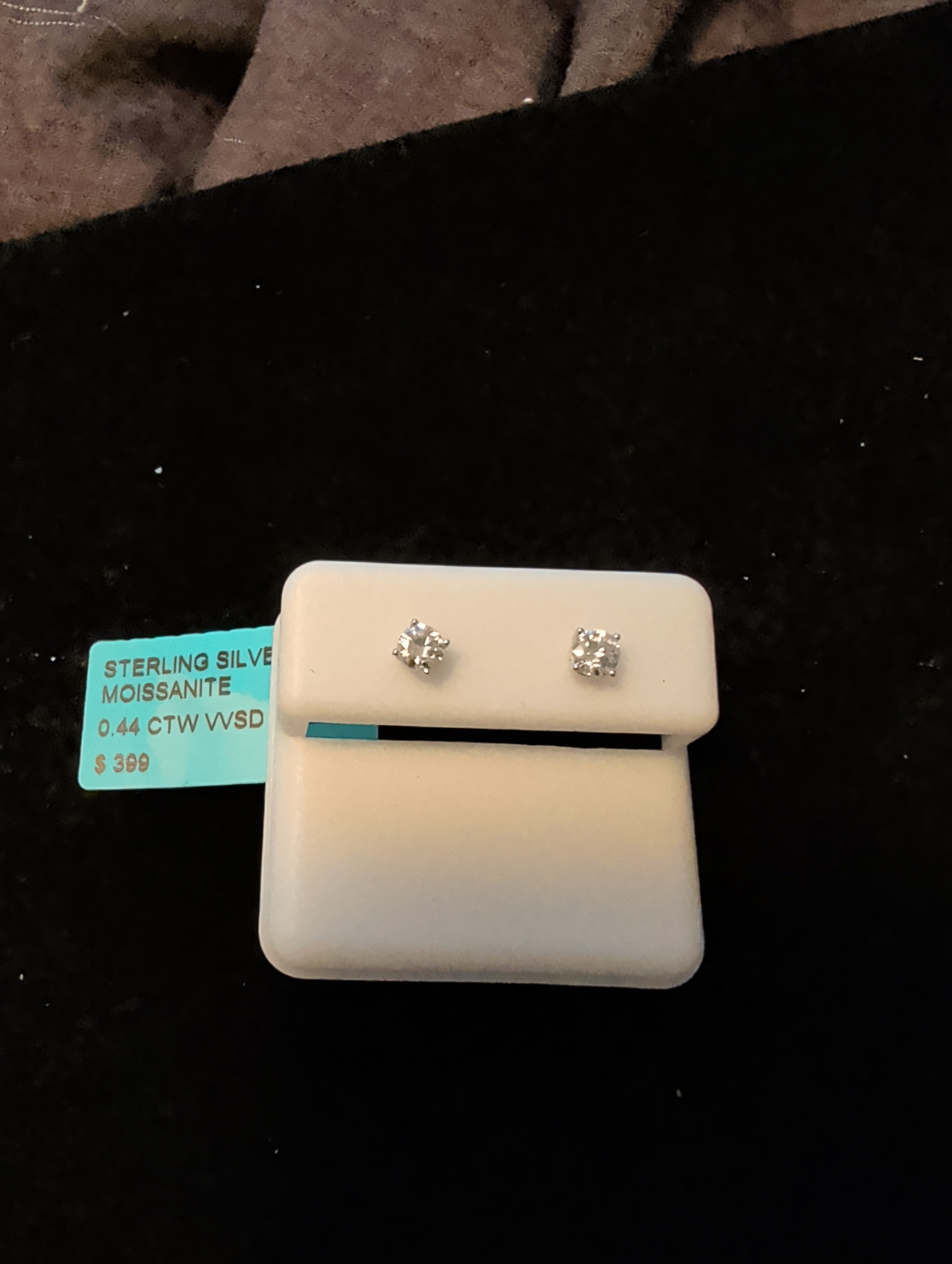 0.44ctw (0.22ctw each) moissanite earrings. 925 sterling silver. Diamond tested!