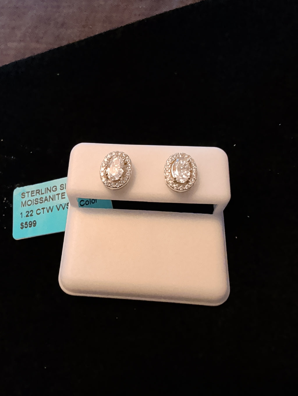 1.22ctw (0.61ctw each) moissanite earrings. 925 sterling silver. Diamond tested!