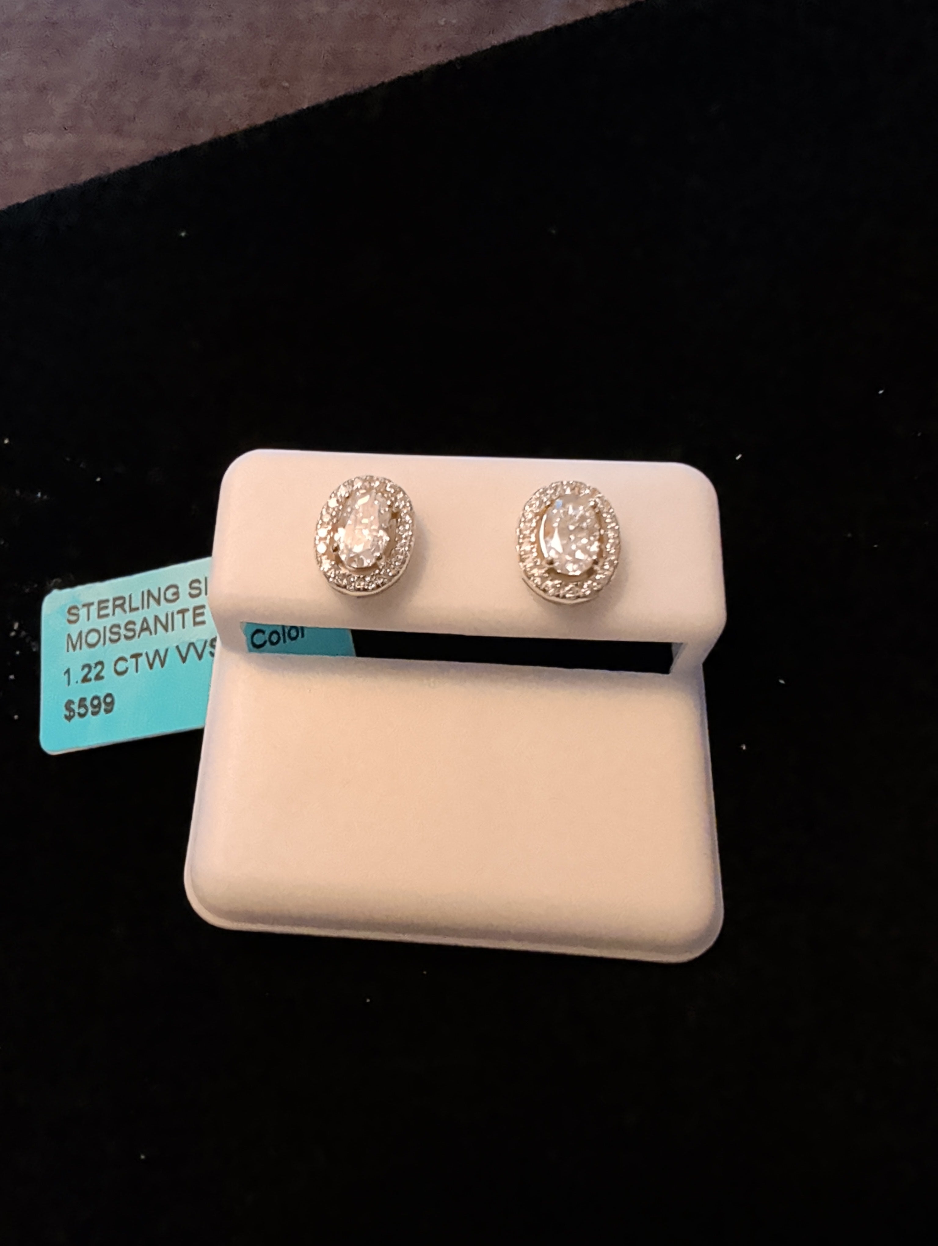 1.22ctw (0.61ctw each) moissanite earrings. 925 sterling silver. Diamond tested!